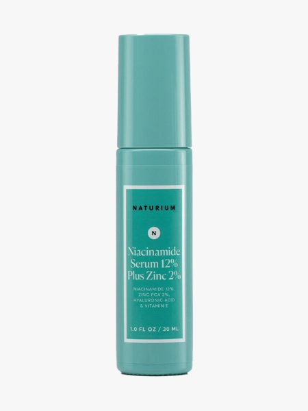 Naturium Niacinamide Serum 12% Plus Zinc 2% teal bottle on light gray background